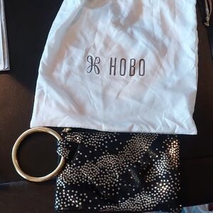 HOBO Black and Gold Clutch with Metallic Accents